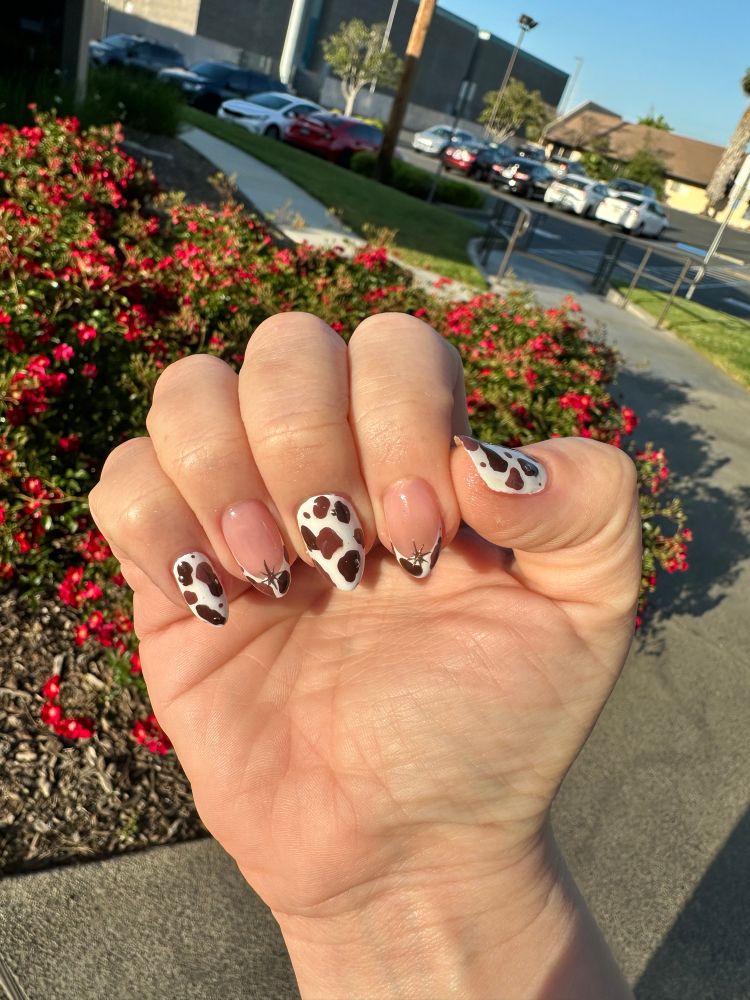 Brown cow print nails