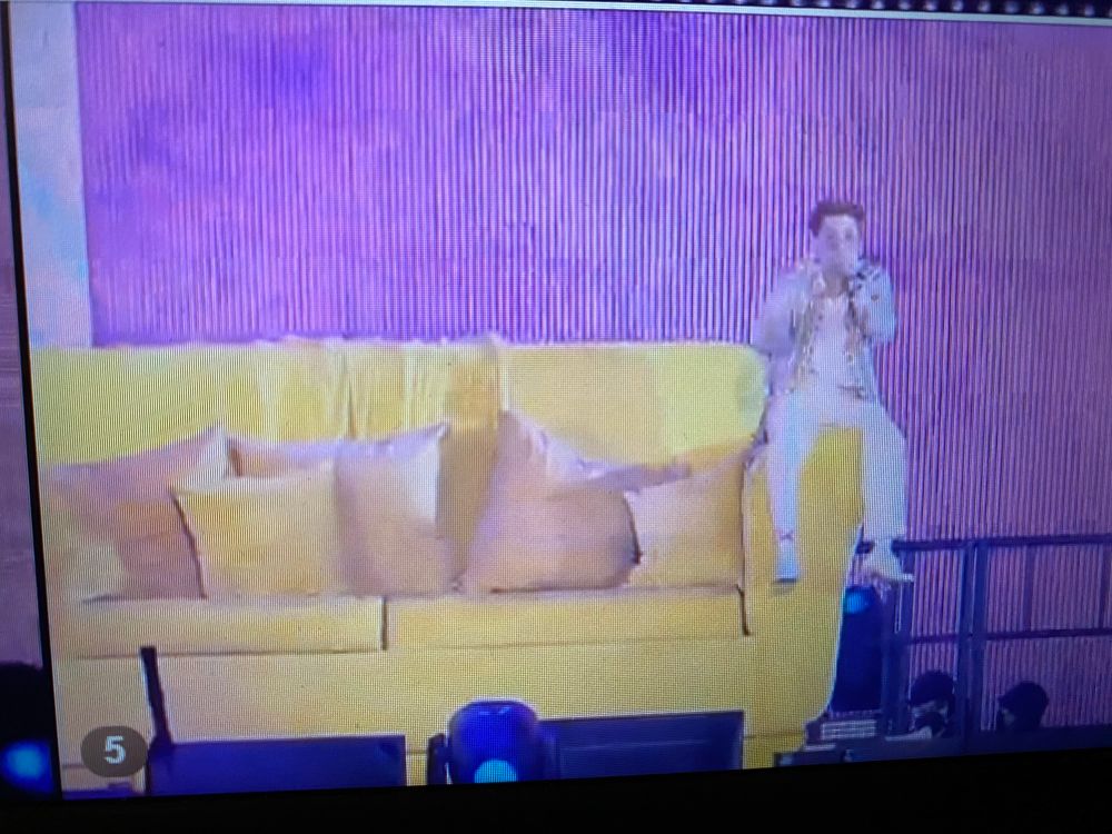 ptd on stage LA, yoongi alone on the arm of the giant yellow couch