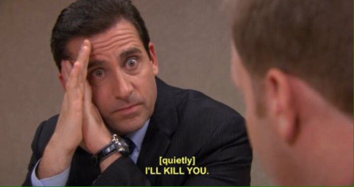 A reaction image from The Office, in which Michael Scott stares wide-eyed and with his hands folded against the side of his face as he whispers, “I’ll kill you.”