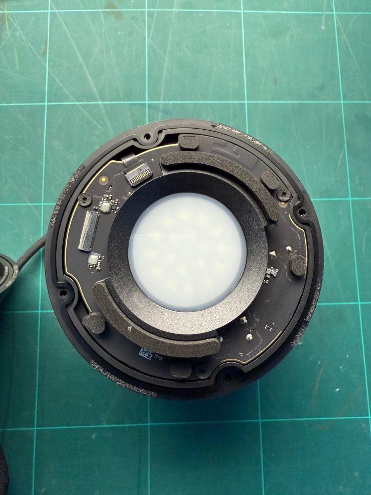 HomePod mini, disassembled, looks a bit like the child of a thermal detonator from Star Wars and the deathstar