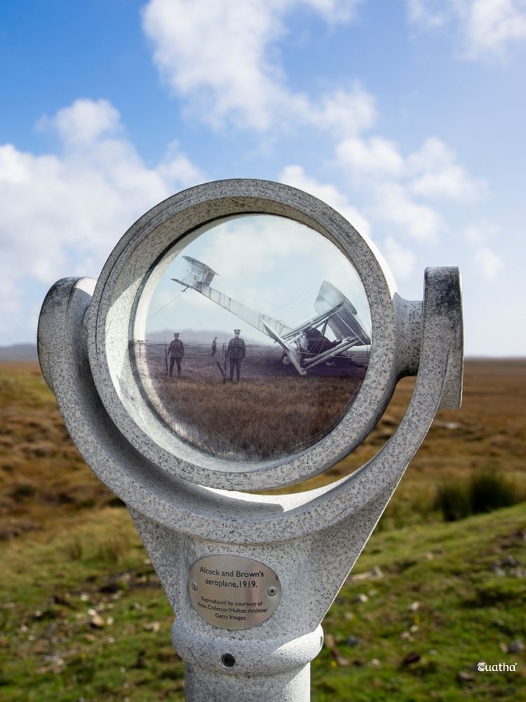 A historioscope - a viewing portal showing a historic image of Alcock and Brown's aircraft on Derrigimlagh Bog 