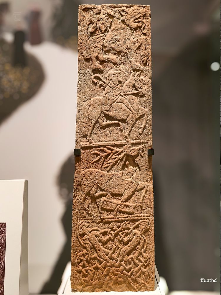 The Banagher Cross shaft. Carefully carved sandstone pillar decorated as described in the caption