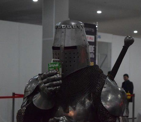 Knight taking a sippy from som juice 