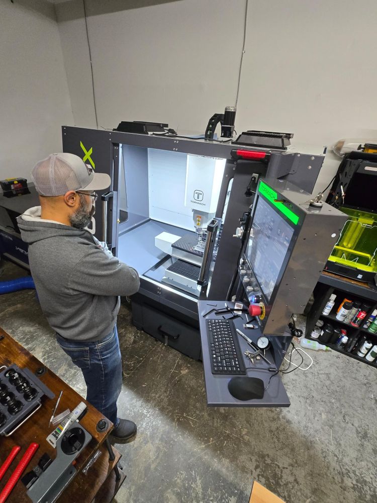 Terrance watching the probe set the XY home coordinates on the Tormach 1100MX