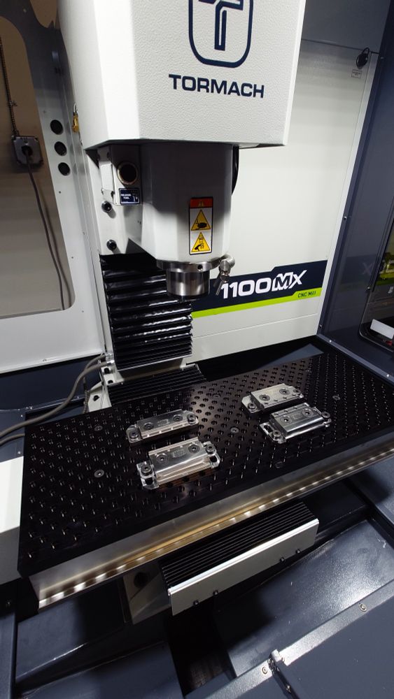 Getting the Tormach 1100 ready for machining the drag brace. 