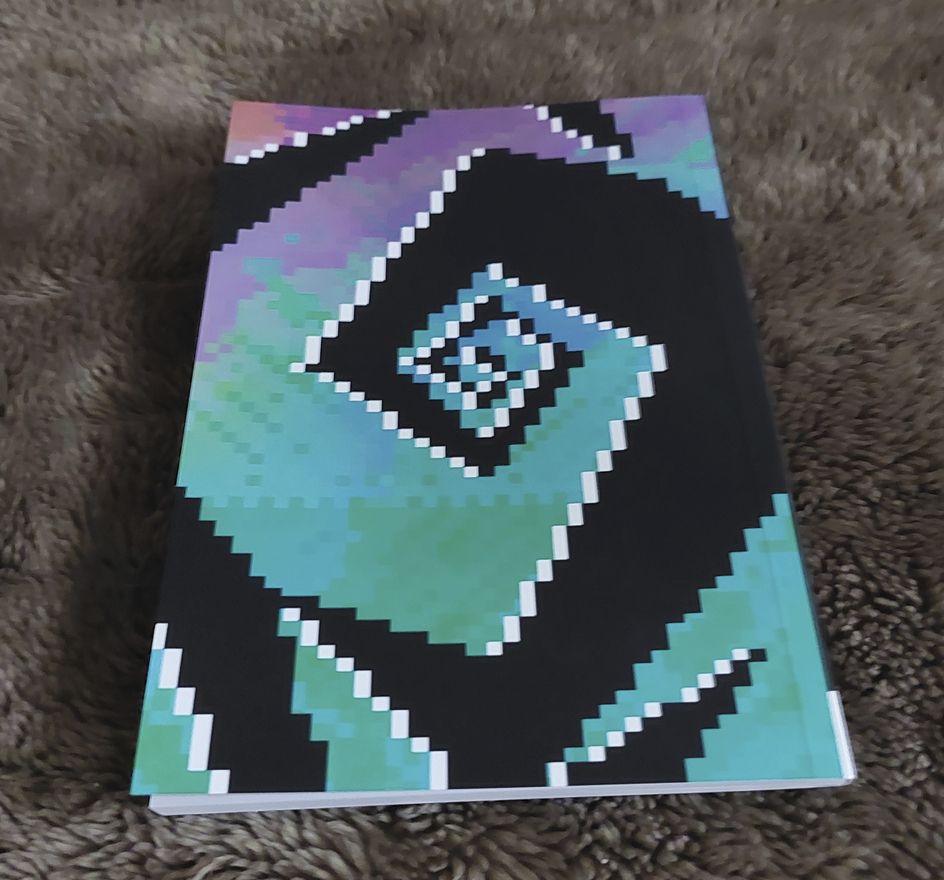 Back page of Liz Ryerson's "Great Art"-featuring a pixel spiral