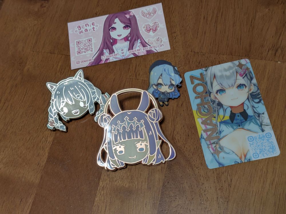 @nachoz.bsky.social‬ Nachoz and @genieart.bsky.social‬ genieart-I50 I think genieart made the Ina and Pekora pins, Nachoz had the Suisei pin