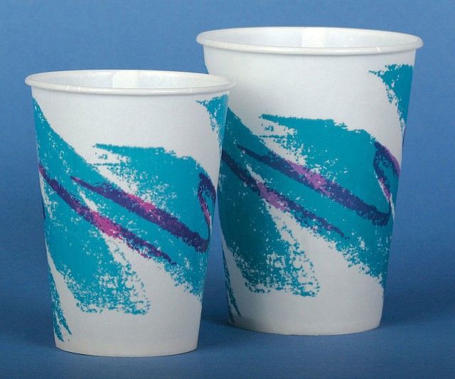 A pair of 90s jazz pattern paper cups (white, teal, with purple stripes)