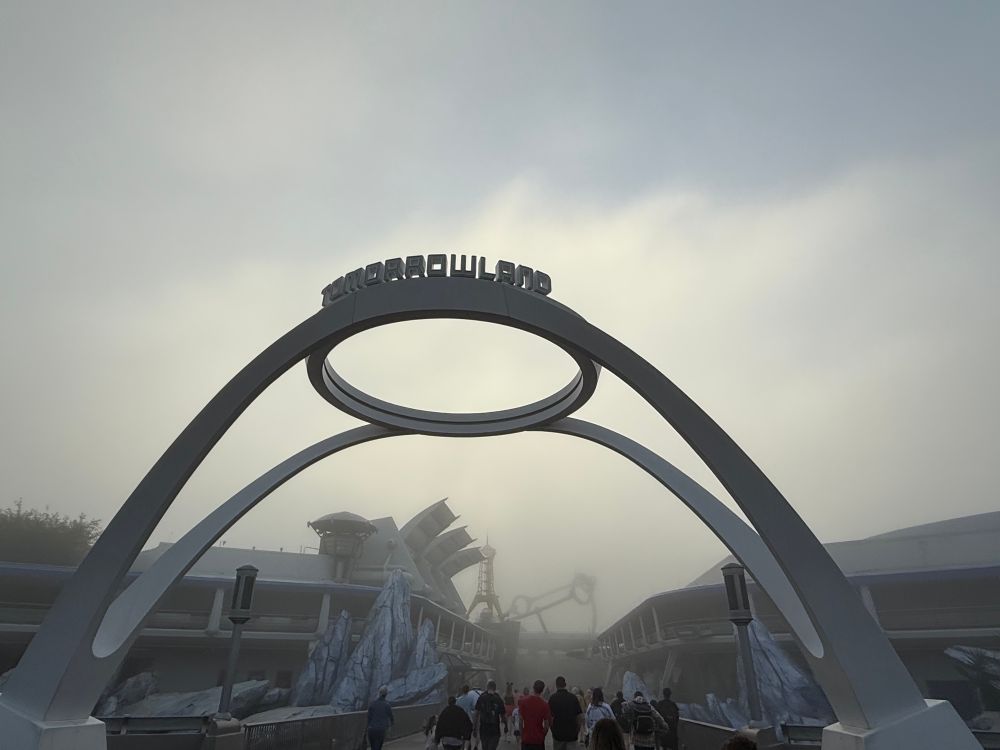 Tomorrowland arches entry way on a very foggy morning