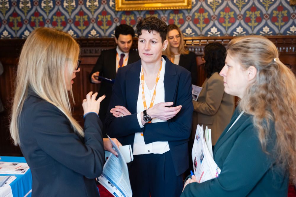 Picture of the Director (Prof Emily Oliver) and Senior Research Fellow (Dr Vivi Antonopoulou) with Rachel Maskell MP at Evidence Week in Parliament. They are in a room with wood panelling and blue and red wallpaper, and are in active conversation