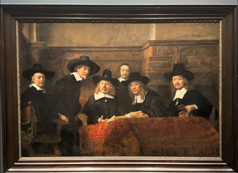 6 old timey lookin dudes staring at you, presumably, for saying something stupid. 