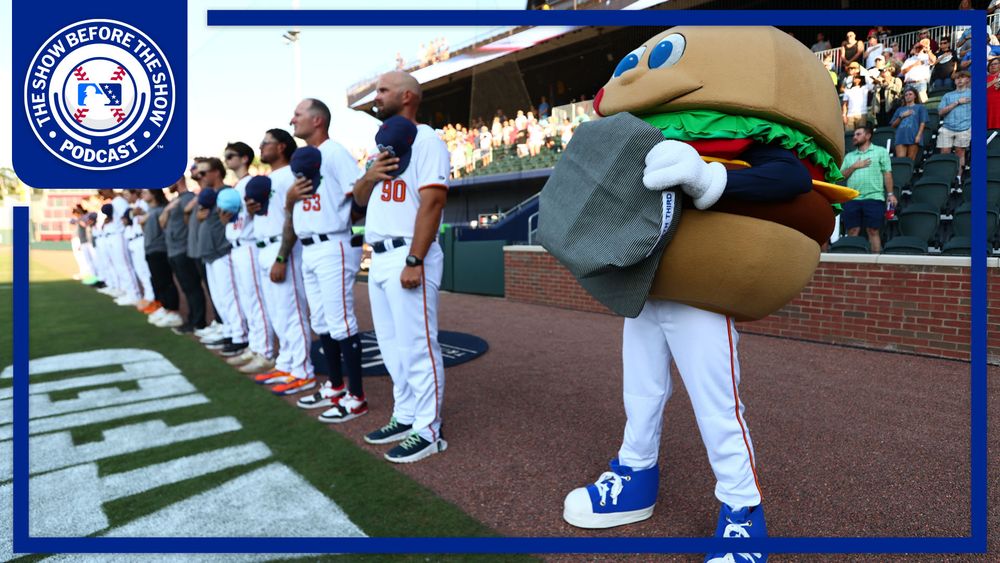 Chuck, a burger mascot for the Hub City Spartanburgers, lines up next to the team during the national anthem. The logo for The Show Before the Show appears in the top-left corner.