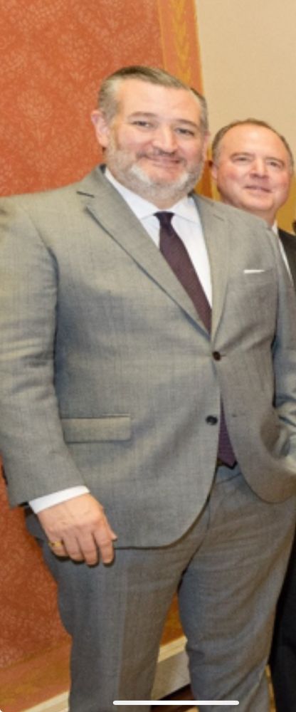 A bloated looking Ted Cruz with Adam Schiff peeking over his shoulder.