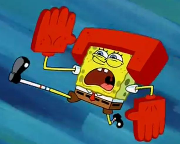 Spongebob Squarepants flying through the air to deliver a karate kick wearing red foam helmet and gloves