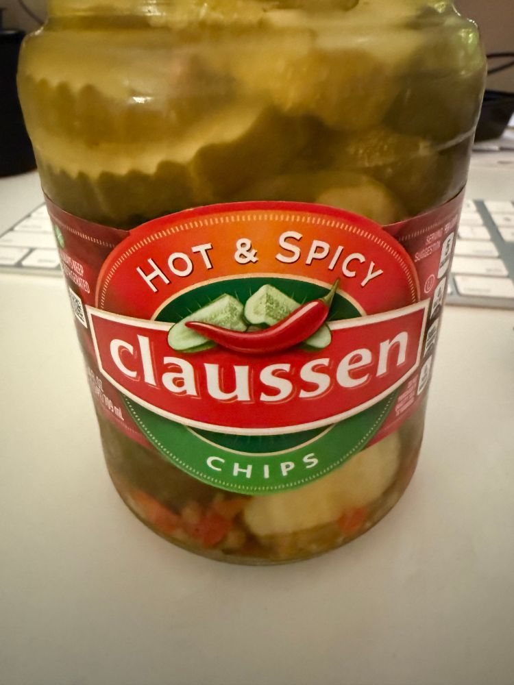 A jar of hot and spicy pickle slices from Clausen. 