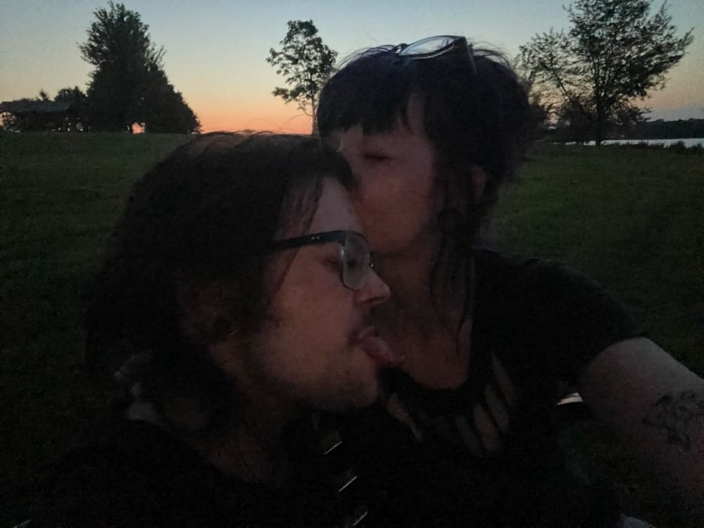 my love and i in the park with a sunset in the background