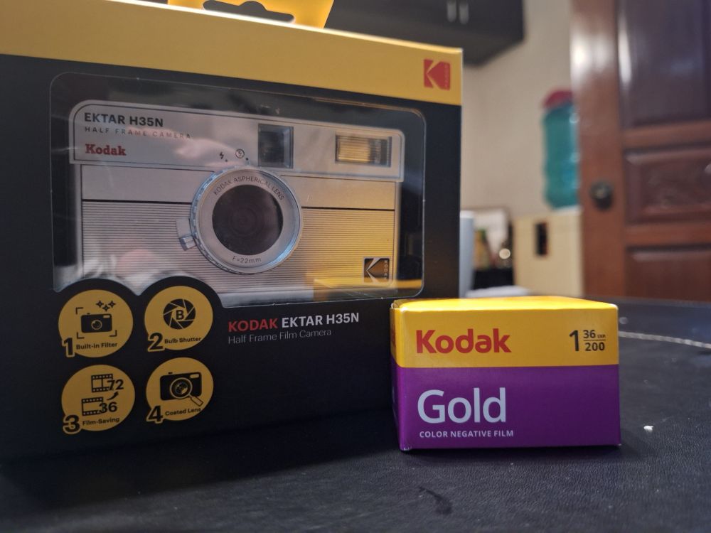 a photo of an Ektar H35N and a Kodak Gold Color Negative Film