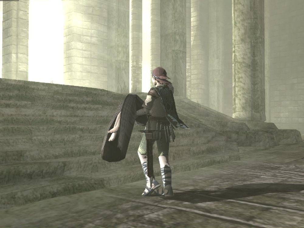Wander carries the body of Mono up to the altar in the temple of the Forbidden Lands in 'Shadow of the Colossus'.