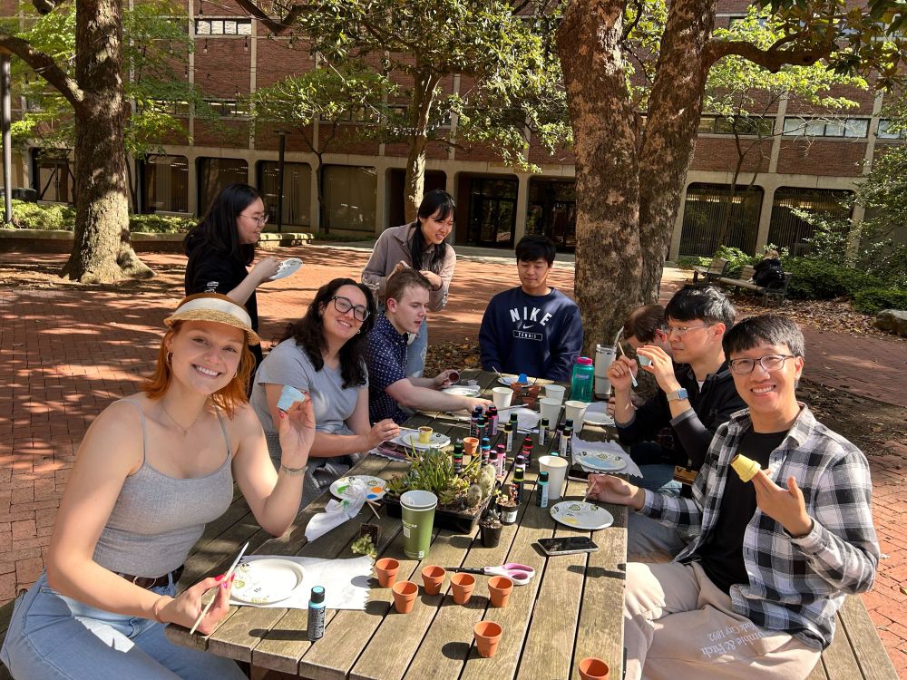 Picture of VALIANT Attempt members painting pots for succulents 