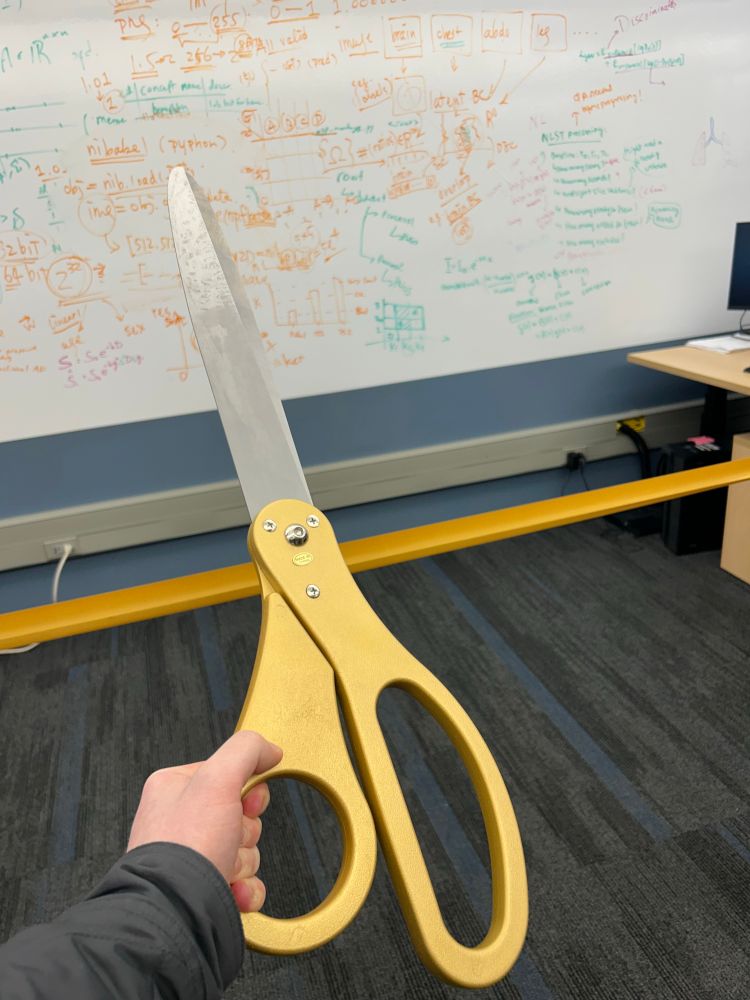 Comically large scissors for the ribbon cutting ceremony