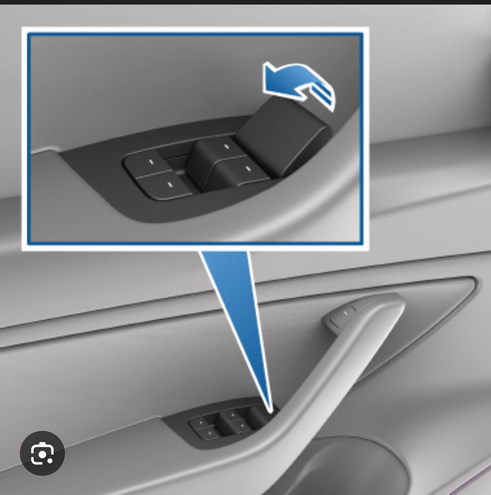 Photo showing manual front door release located in a Tesla Model 3/Y
