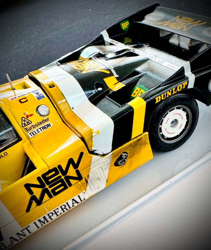 The finished Tamiya Newman Porsche 956, with race exhaust and wear. 