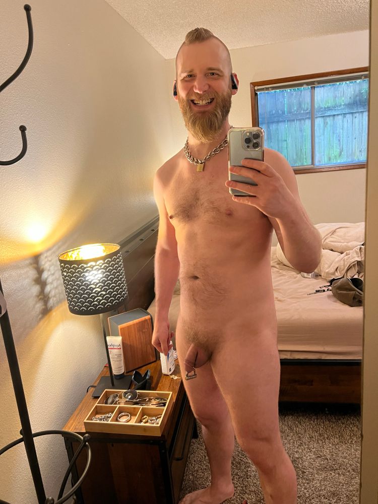 Naked mirror selfie with PA lock and locked chain necklace.  