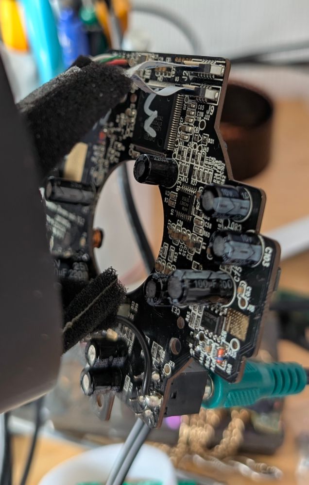 A photo of the printed circuit board inside a Razer Nommo Chroma.
