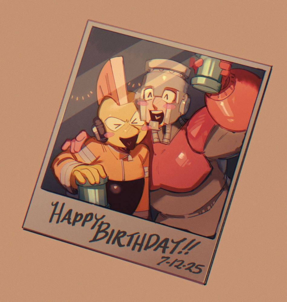 A Polaroid of fireman’s and bombman. The two lean into each other looking happy and possibly inebriated. They’re both holding Etanks.
