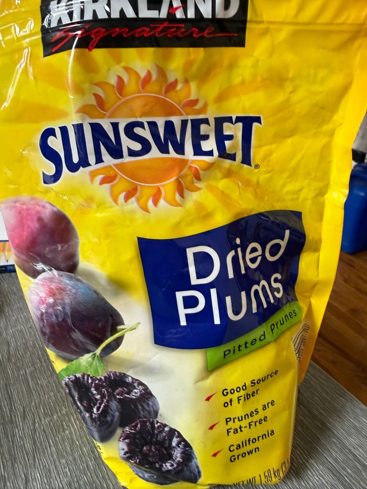 A yellow 3.5 lb bag of Sunsweet Dried Plums, aka prunes 