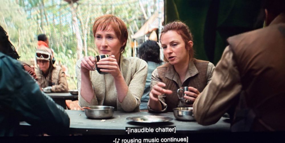 Mon Mothma and Val from Andor eating together with the rebels on Yavin