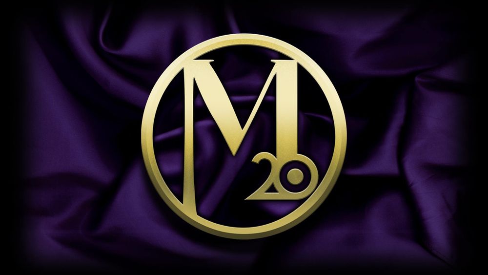 Purple background, gold m and gold 20, Mage the Ascension 20th anniversary edition symbol.