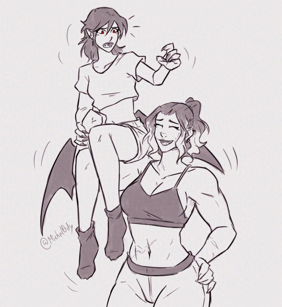 Muscular girl Jo smiling and flexing her bicep while the skinny vampire girl Kat is sitting on her bicep, looking agitated and embarassed.