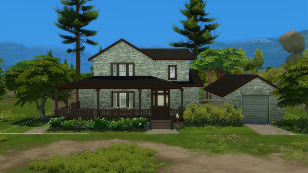 A grey brick house in the Sims with a garage and wrap around porch