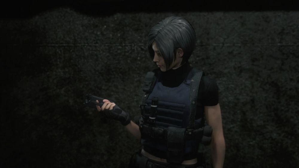 Screenshot of Ada in RE2R. She's holding her "secret weapon" the scanner/hacking thingie.
Her outfit is modded to a tactical outfit with pouches and a bulletproof vest. It's meant to resemble her assignment Ada outfit from RE4 