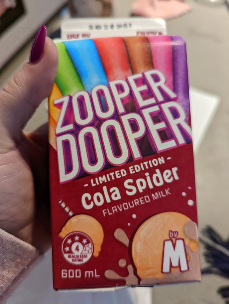 A cola "spider" in a carton--or cola flavored milk--and the brand is Zooper Dooper. This is limited edition...thank God. Yes, my boyfriend drinks this and thinks this is normal.