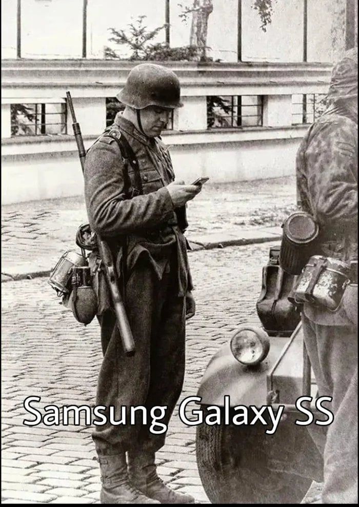 Picture of a Nazi holding a smart phone with caption: Samsung SS