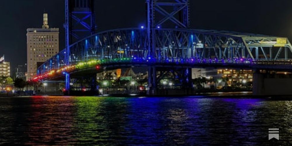 Locals Defy DeSantis Pride Light Ban, Light Bridge Up With Flashlights In Jacksonville