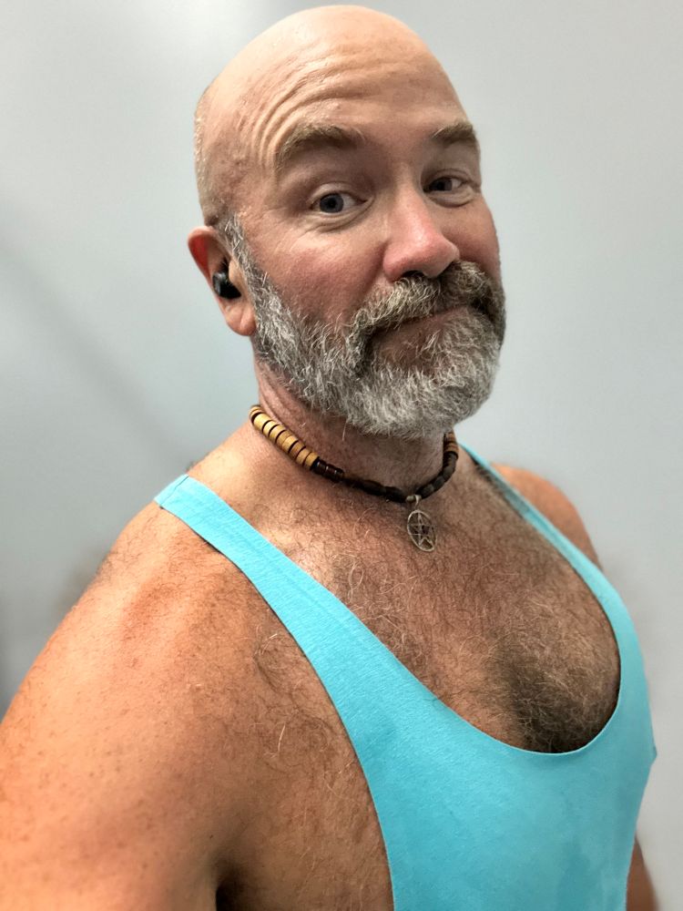 Man in blue tank 