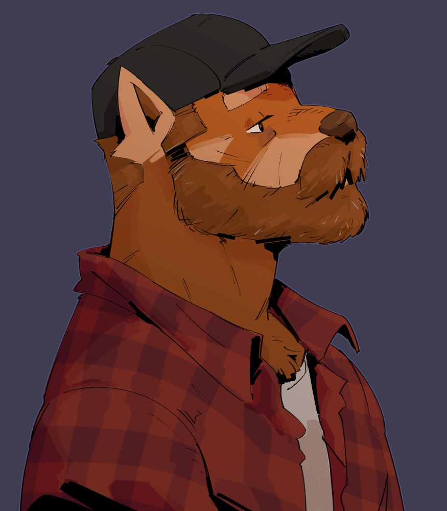 Older Dennis wearing a cool hat and flannel shirt 