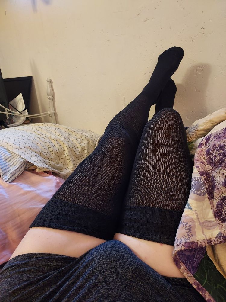 Carol's legs, in thigh length black socks. And yes, there's bulge at the bottom of the picture, get over it.