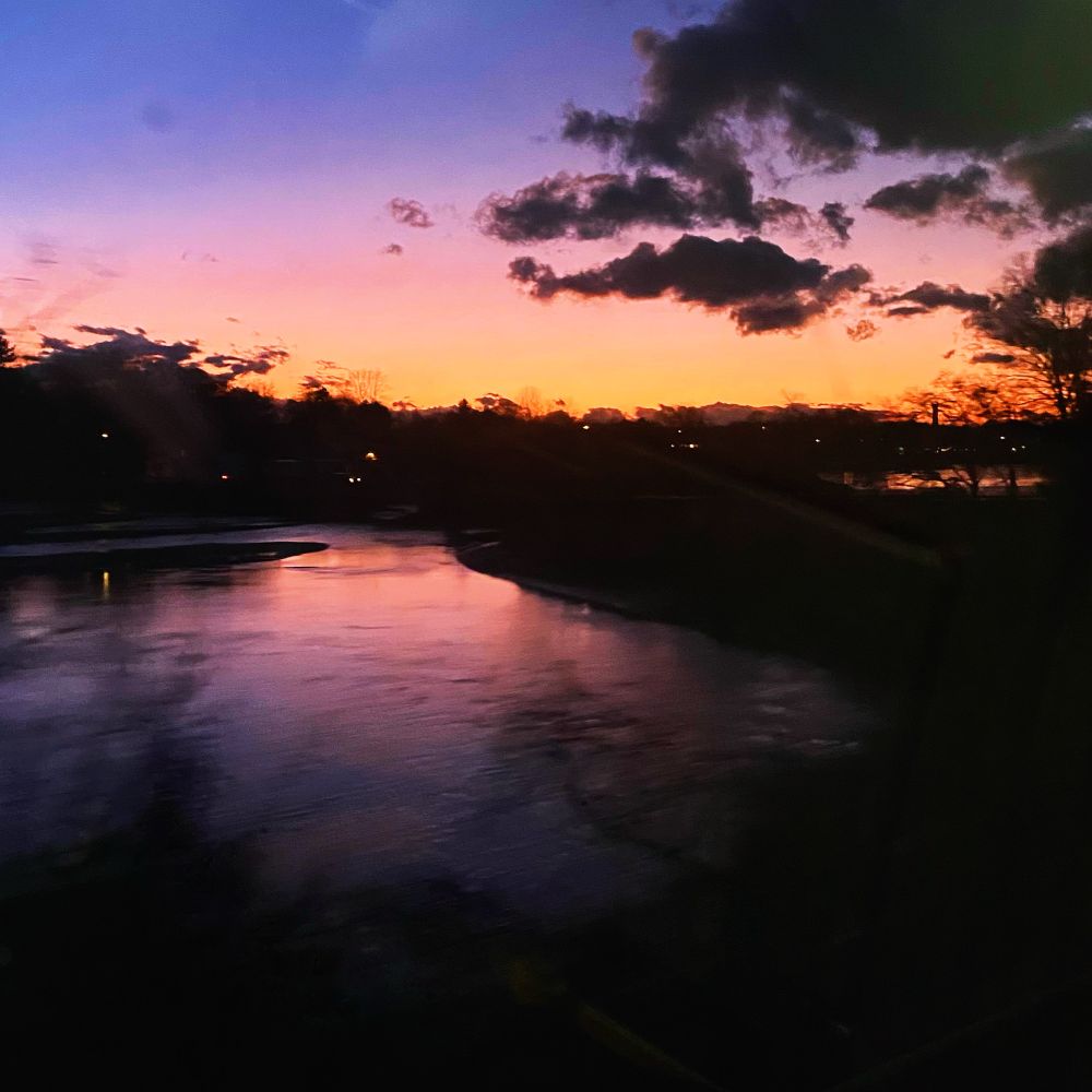Spectacular sunset view passing through Connecticut by train. 