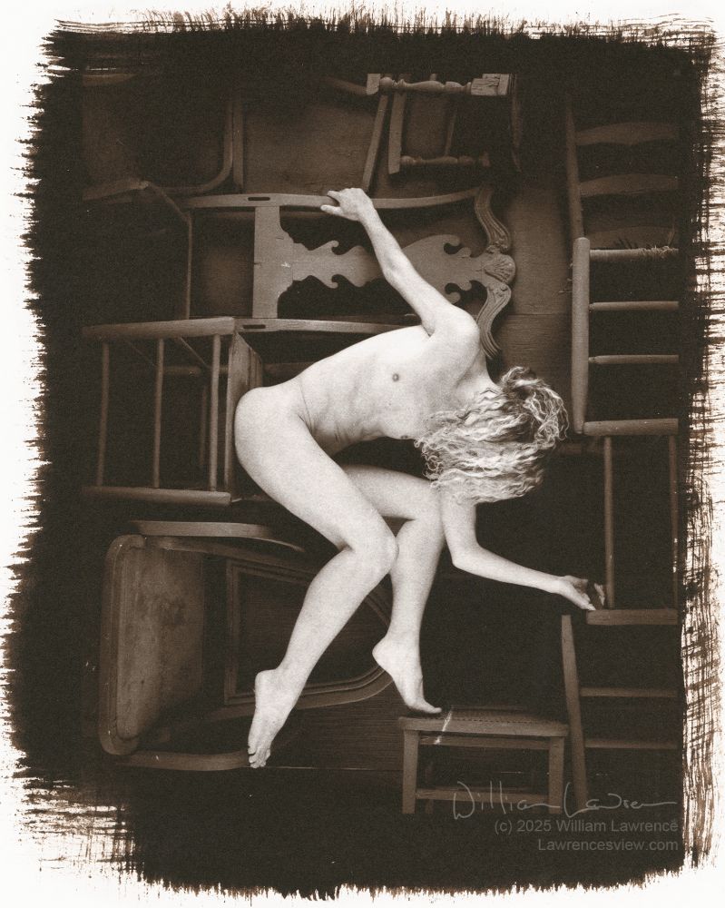 Gold-toned kallitype of model Vivian Cove, posing on a bunch of chairs extending through the frame both horizontally and vertically.