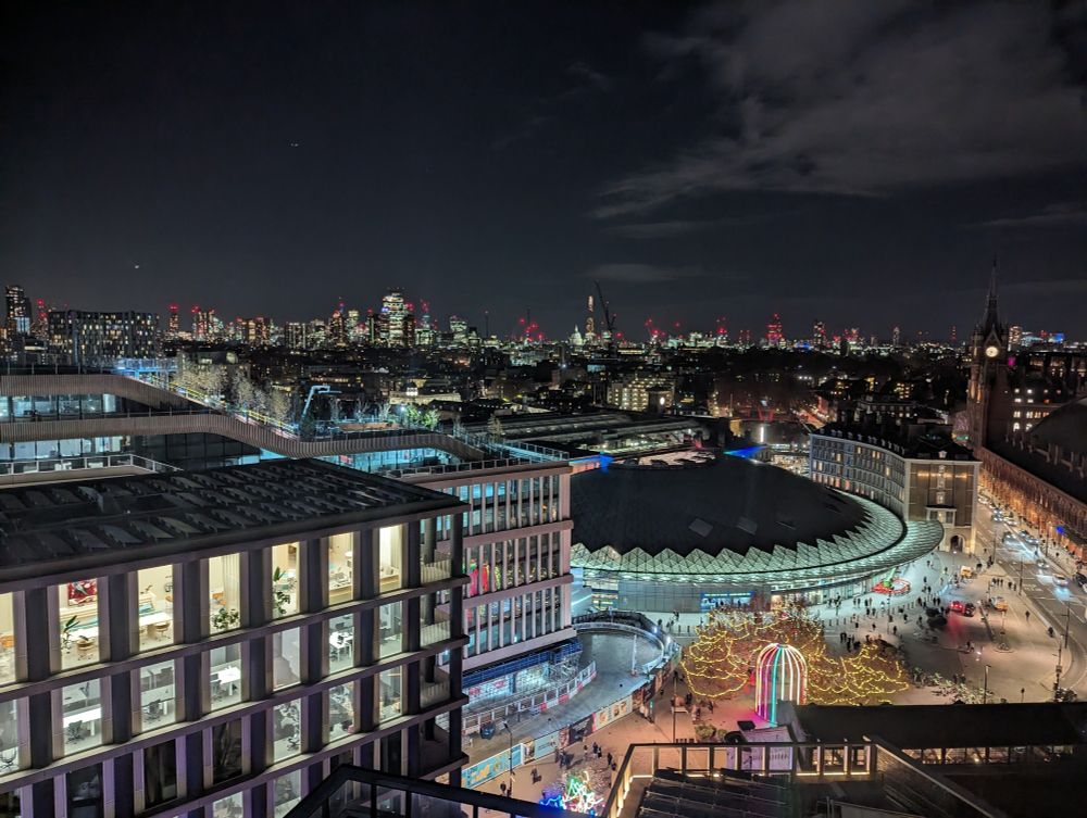 City scape of Kings Cross, London, with Christmas decorations at night