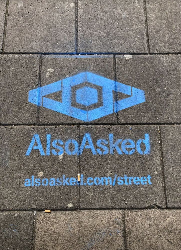 A stencil of "AlsoAsked.com" that we went and sprayed outside because Mordy told us to.