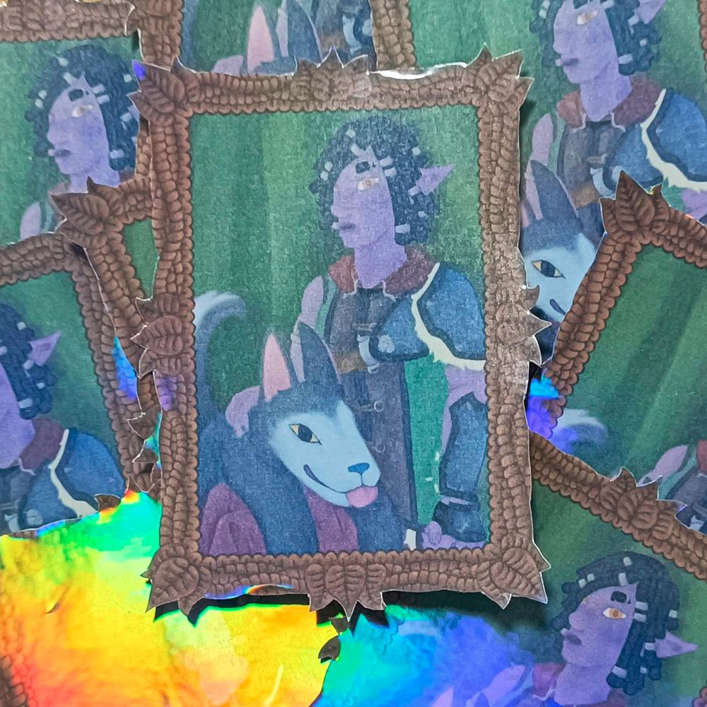a photograph of a pile of stickers of the previous image, they have a holographic overlay on them