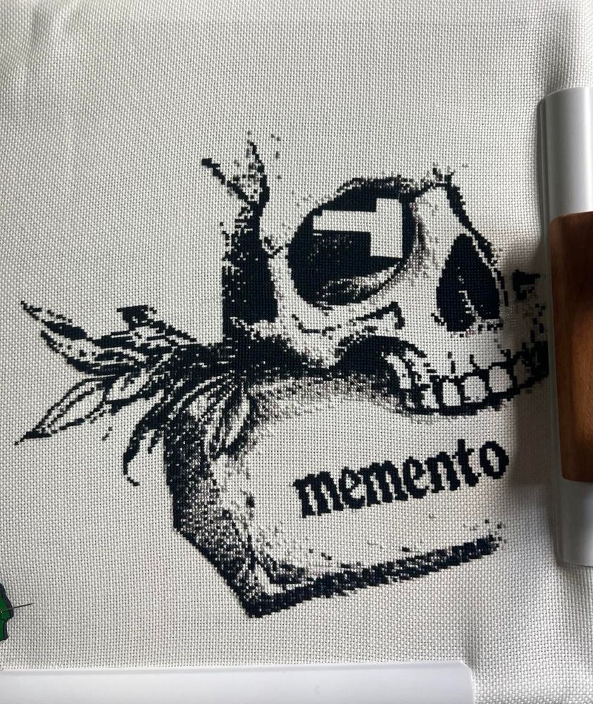 Progress picture of my memento mori skull cross stitch project.