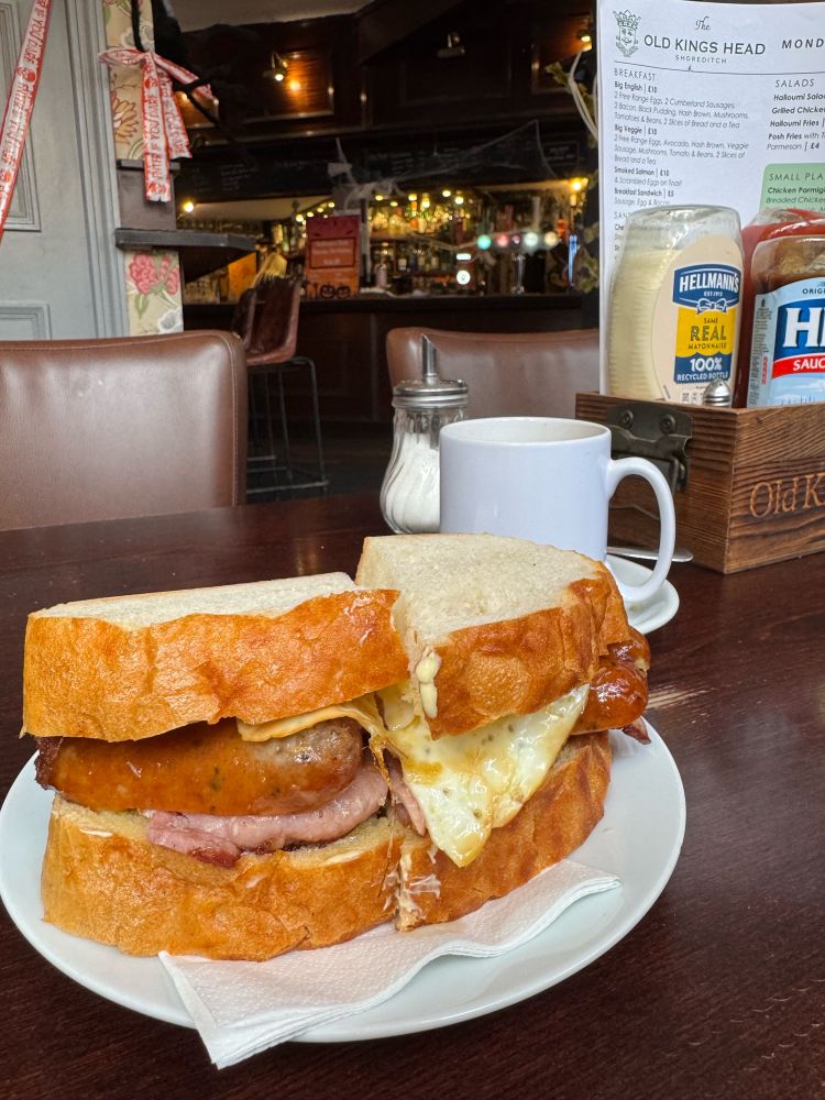 Glorious sausage egg and bacon sandwich