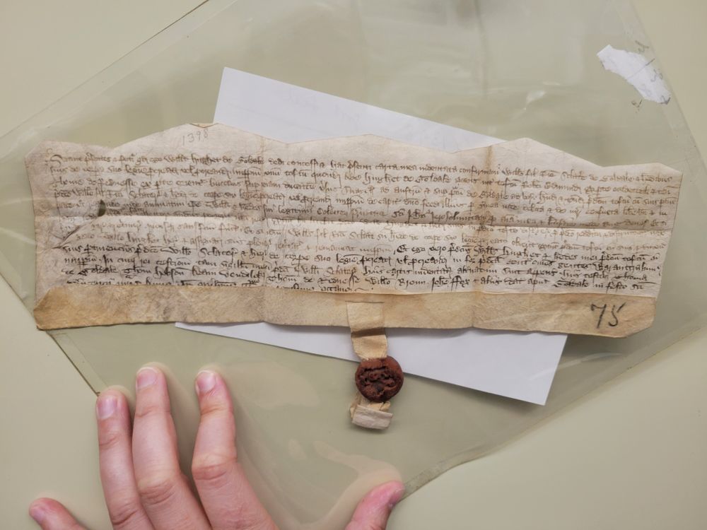 fragment of unidentified Latin mss with a wax seal