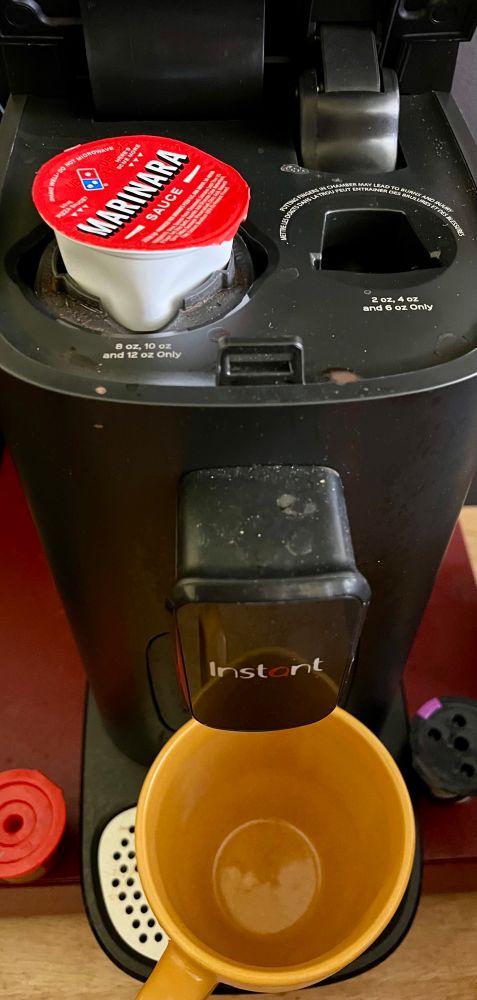 Instant(tm) Coffee maker with a Marinara cup (from Domino’s) in the Kcup slot. 